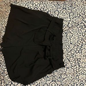 Trash bag style high waisted shorts